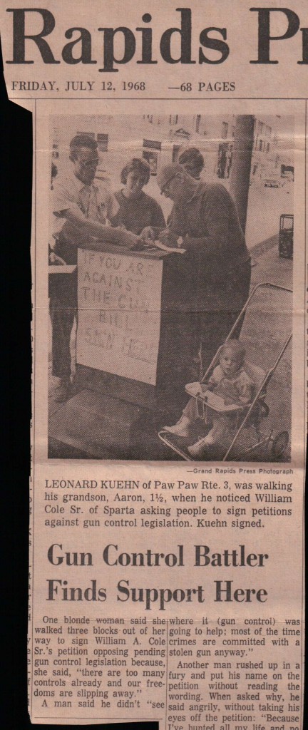 Dad signing a petition against the Gun Control Act of 1968. The Grand Rapids Press photographer didn't believe he was my father and insisted and crediting me as his grandson.
